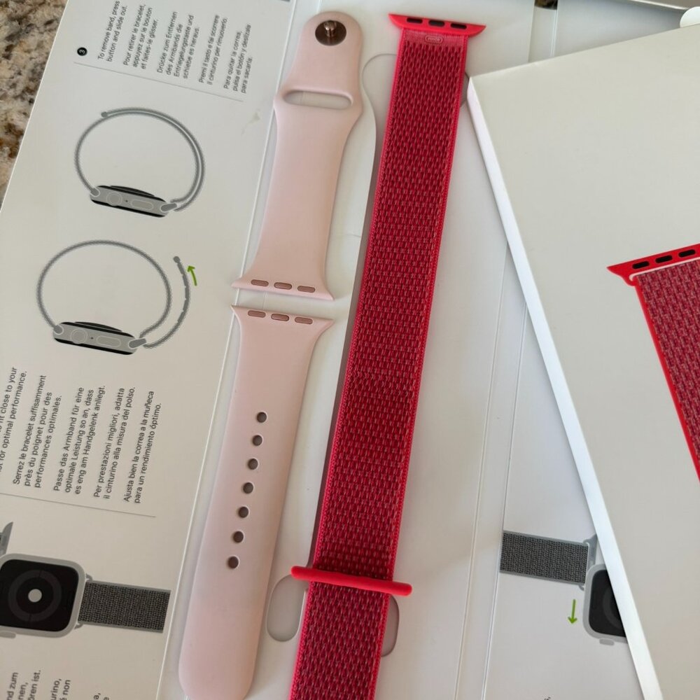 4S original iWatch wrist bands. One (in salmon) is New in box